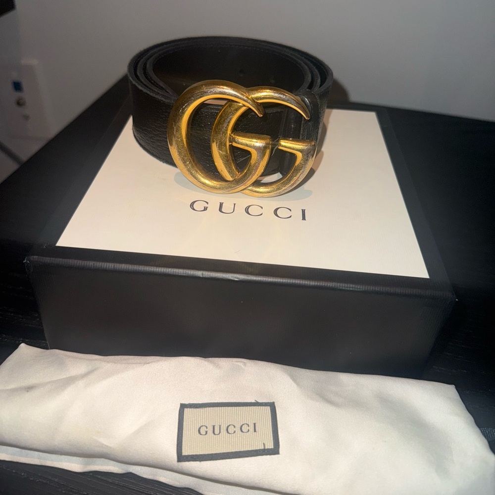 Gucci Black and Gold Leather Belt with Iconic GG Buckle